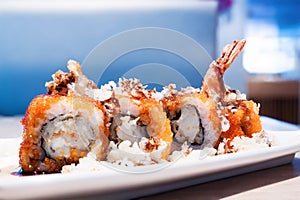 Tempura Maki Sushi with fish eggs, salmon