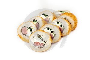 Tempura roll with tuna on a white plate, classic Japanese sushi. Traditional Japanese food with maki. Delicious pieces of sushi.