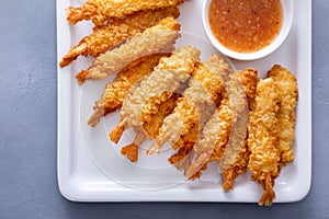 Tempura shrimp on a plate served with sweet and sour sauce