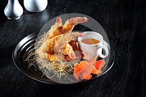 tempura shrimps on dark grey back