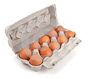 Ten brown eggs in a carton package