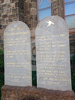 Ten Commandments Written on Stone Tablets in front of a Church.