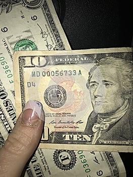 Ten dollar bill close up photo