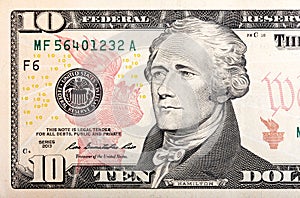 Ten dollars bill fragment of U.S. money in macro.