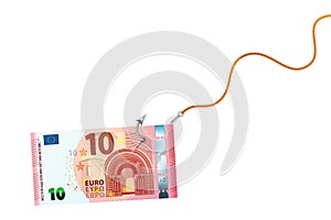 Ten euro banknote on glossy silver metal fishing hook on a rope on white