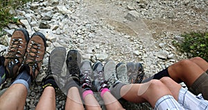 Ten legs of the five-person family while resting after the hike photo