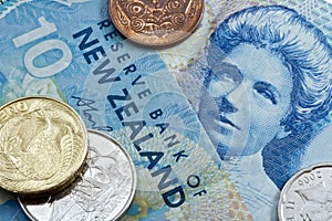 Ten new zealand dollar with coins