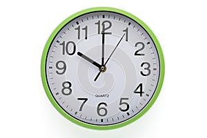 Ten o`clock. Wall clock showing time. Clipping path included. White background