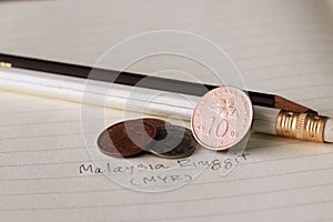 Ten sen Malaysia ringgit coin on reverse , Line image of Hibiscus rosa-sinensis and five sen with two coins of one sen.