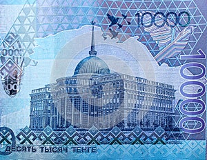 Ten thousand kazakhstani enge banknote close up. Akorda building