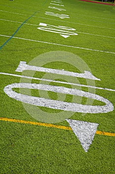 Ten yard line of football field  tillted at an angle