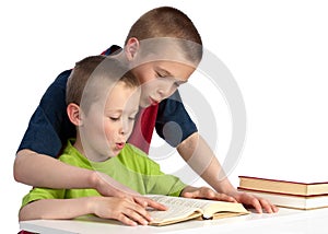 Ten-year-old teching his kid brother to read