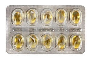 Ten yellow medical pills packed in a blister pack