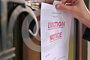 tenant's eviction notice gluing to the door