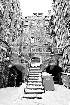 Tenants buildings with large staircase, Edinburgh, Scotland covered with snow photo