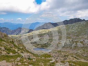 Tende - Panoramic view of small glacier pond in the Mercantour National Park in the Valley of Marvels near Tende