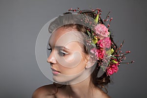 Tender beauty portrait of bride with roses wreath in hair