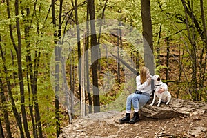 Tender blonde woman and her dog