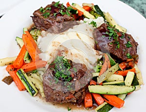 Tender braised beef short ribs photo