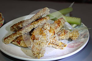 Tender chicken breaded with vegetables