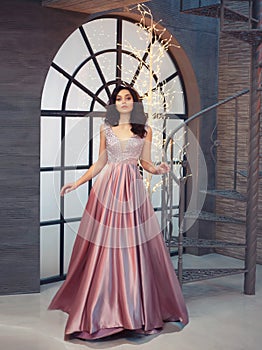 Tender gorgeous graceful lady at vintage stairs, girl in long gorgeous pink tender dress with sparkles, attractive