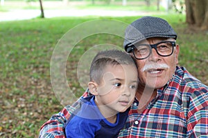 Tender image of grandparent with grandson