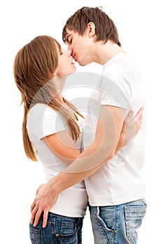 Tender kiss of young couple photo