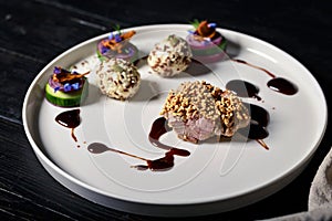 Tender meat with puffed rice. Dish of authors cuisine. Turkey meat recipe from a restaurant photo