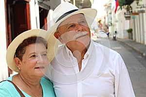 Tender older ethnic couple candid