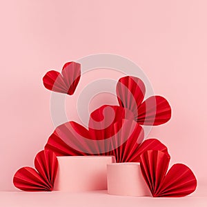 Tender pastel pink stage mockup with two round podiums, fly passion red paper hearts of asian fans in chinese style, square.