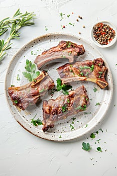 Tender pork ribs glazed with BBQ sauce, garnished with fresh rosemary