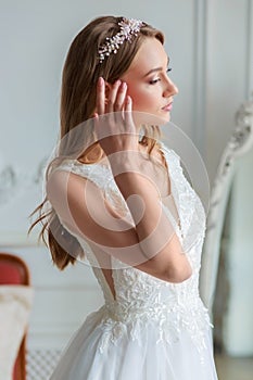 Tender portrait of a beautiful woman bride, wedding make-up