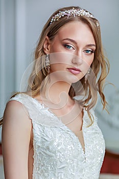 Tender portrait of a beautiful woman bride, wedding make-up