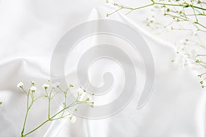 Tender wedding background. Smooth elegant white silk or satin luxury cloth texture. Luxurious background design. Copy space