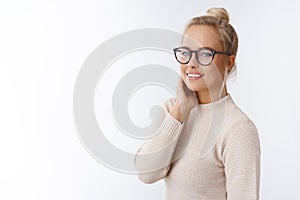 Tenderness, sensuality and beauty concept. Beautiful gentle and stylish young woman with pure clear skin wearing glasses