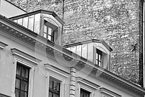 Tenement house with brick wall in black & white