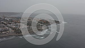 Tenerife on the eve of Kalima. The coast in the haze. Panorama of the city.