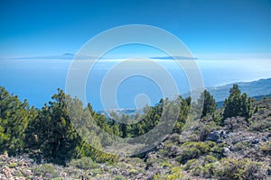 Tenerife and La Gomera viewed from Pico de la Nieve at La Palma, Canary islands, Spain photo