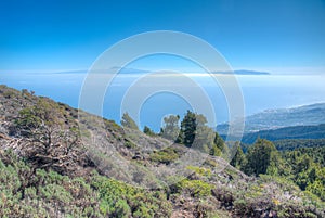 Tenerife and La Gomera viewed from Pico de la Nieve at La Palma, Canary islands, Spain photo