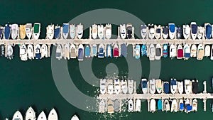 Tenerife, Los Gigantes, Spain - May 18, 2018: Aerial view of modern sail boats, yachts in a seafront