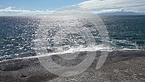 Tenerife, Spain - 29. July 2023: Boats and other vehicles doing watersports on the blue atlantic ocean