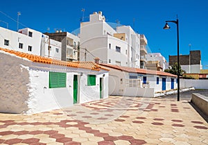 Tenerife. White houses on the street in Las Galletas, Tenerife, Canary Islands, Spain. Artistic picture. Beauty world photo