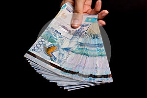 Tenge on black background. Kazakh money. Banknotes tenge. Money Kazakhstan Tenge