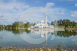 Kuala Ibai Floating Mosque or formally named as Tengku Tengah Zaharah Mosque and it`s reflection in water at Terengganu, Malaysia. photo