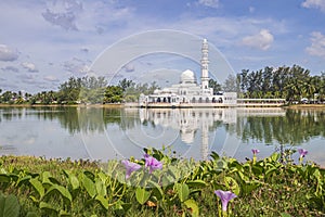 Kuala Ibai Floating Mosque or formally named as Tengku Tengah Zaharah Mosque and it`s reflection in water at Terengganu, Malaysia. photo