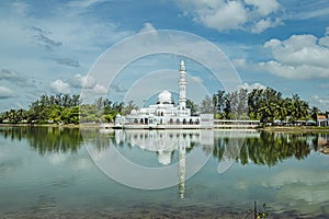 Kuala Ibai Floating Mosque or formally named as Tengku Tengah Zaharah Mosque and it`s reflection in water at Terengganu, Malaysia. photo