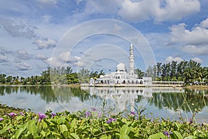 Kuala Ibai Floating Mosque or formally named as Tengku Tengah Zaharah Mosque and it`s reflection in water at Terengganu, Malaysia. photo