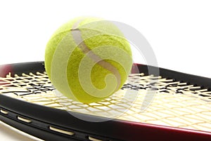 Tenis ball and racquet photo