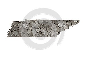 Tennessee State Map Outline and Pile of Nickels, Money Concept photo