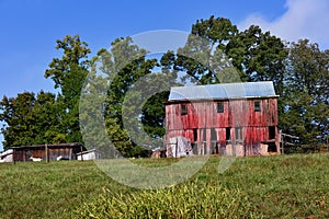 Tennessee Wooden Barn is Weathered Worn and Faded